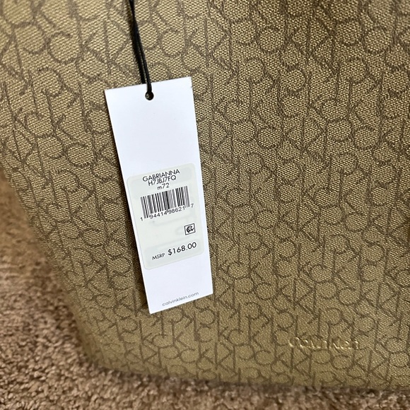 Calvin Klein beautiful nuetral bag with free accessories bag included - Picture 4 of 6